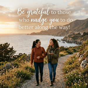 Two friends walking by the coast beneath text, "Be grateful to those who nudge you to do better along the way!"